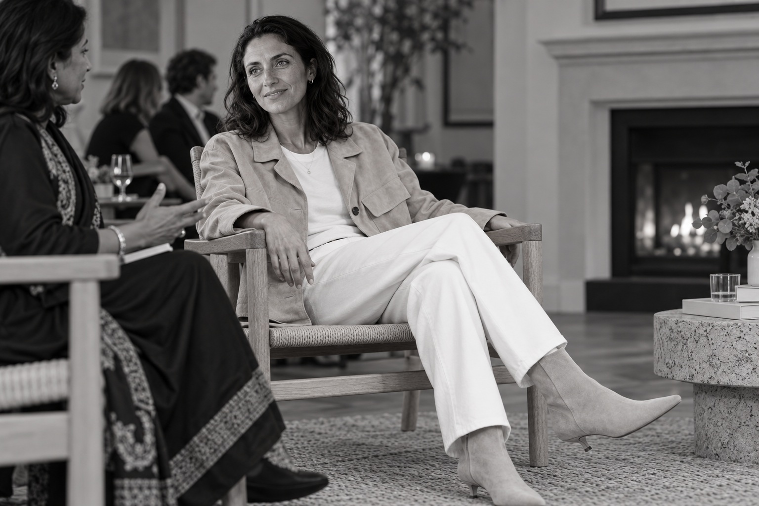 Seated conversation between the host and an Indian guest