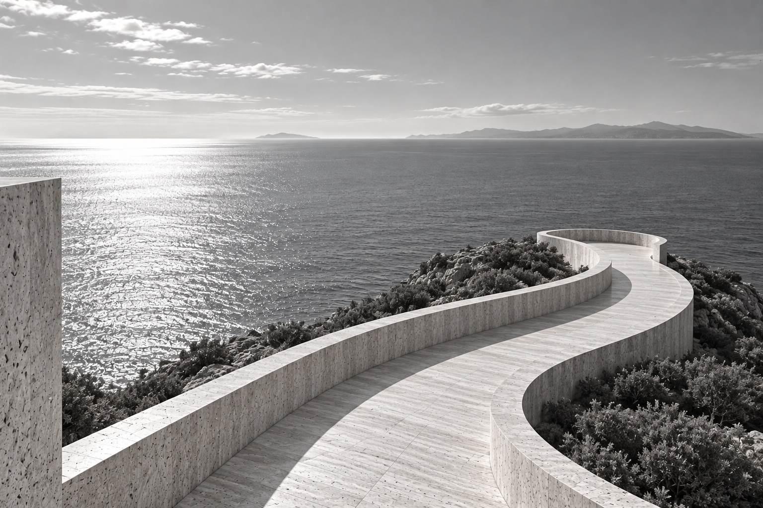 Curving coastal promenade toward an open horizon